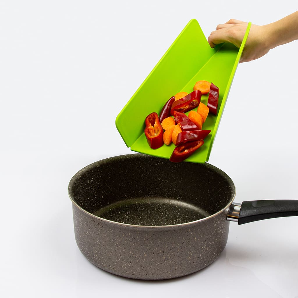 Folding cutting board used to transfer ingredients into a pot