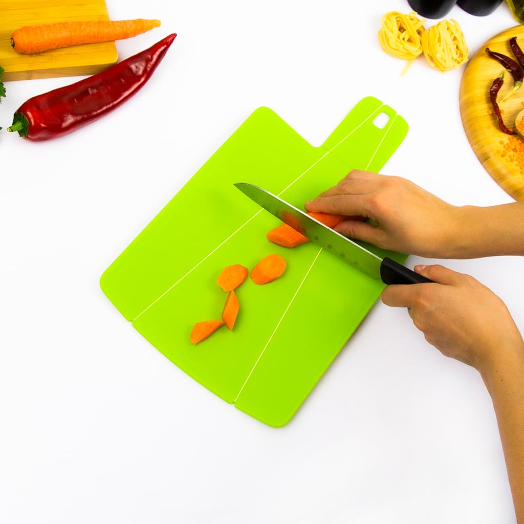 Produced folding DecoBella cutting board during food preparation