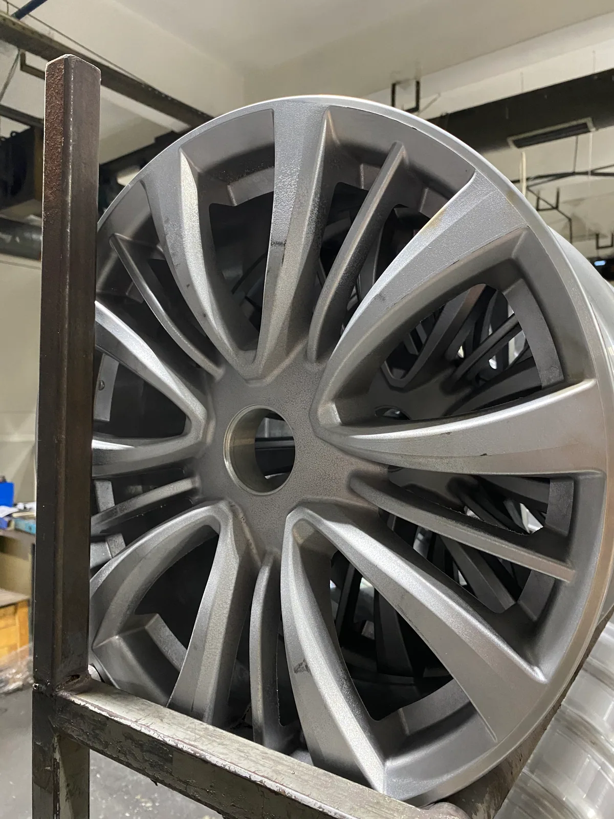 Front view of a manufactured alloy wheel developed for Kormetal